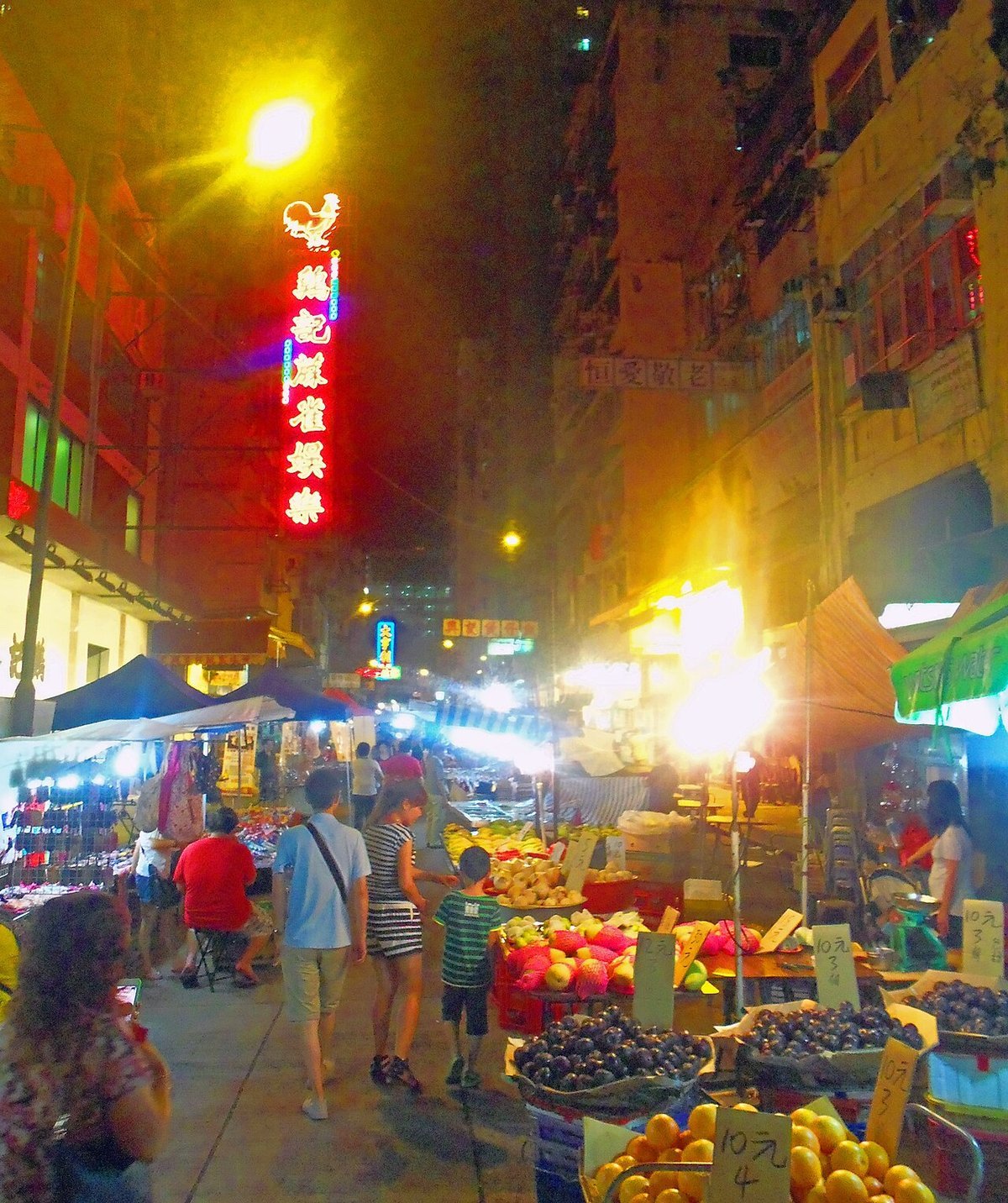 Food stalls and lights at the Temple Street Night Market in Kowloon, Hong Kong